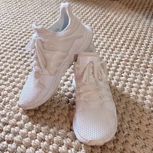 White Adidas tennis shoes